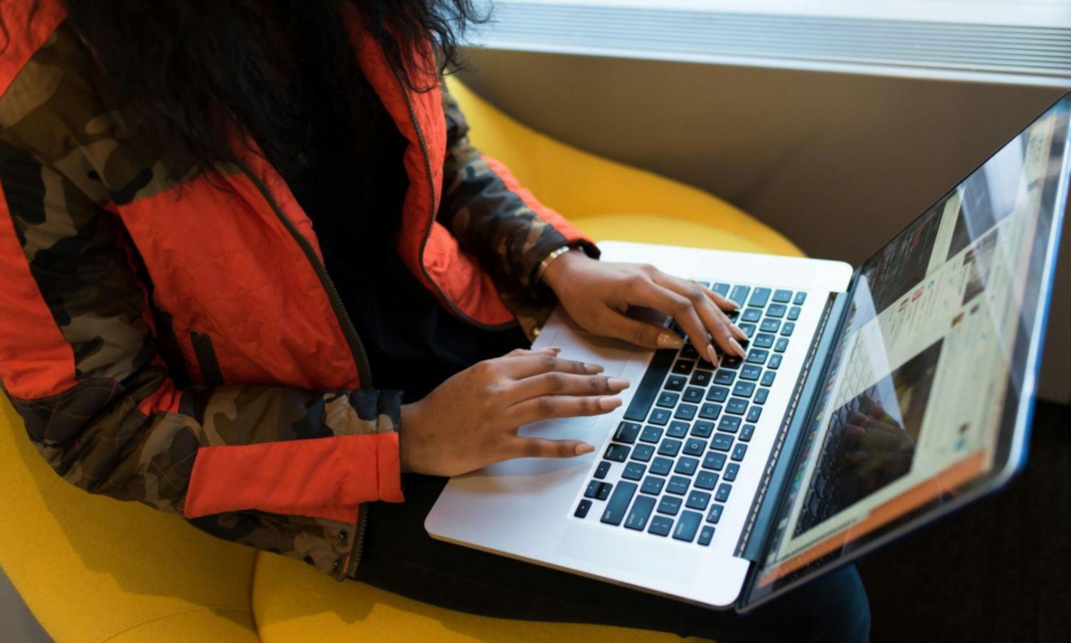 Professional analyst presenting financial model results to colleagues